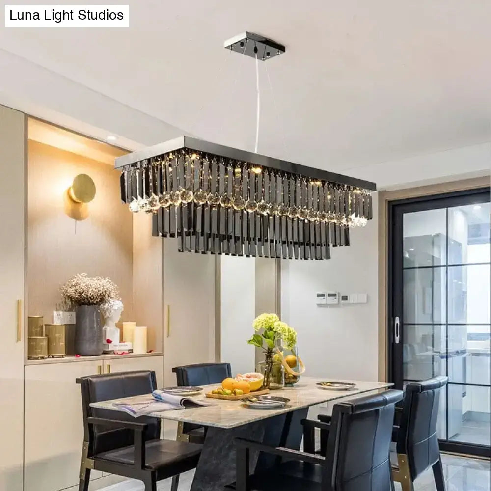 Modern black rectangle crystal chandelier by decorbites with hanging crystal droplets and sleek metallic frame