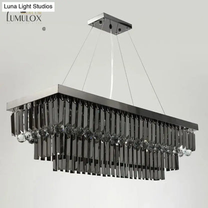 Modern black rectangle crystal chandelier by DecorBites with sleek chrome finish and cascading black crystal prisms
