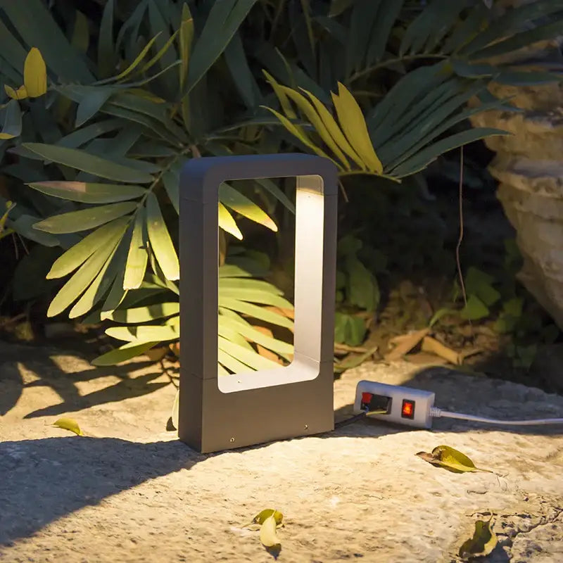 Modern black rectangular led lawn light with sleek dark gray frame and illuminated panel for garden landscape use