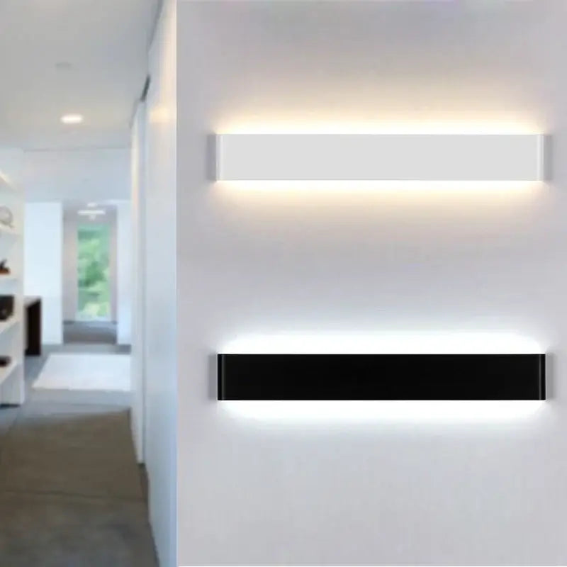 Modern black and white rectangular led wall lamps with minimalist design emitting warm glow for bedroom wall lamp use