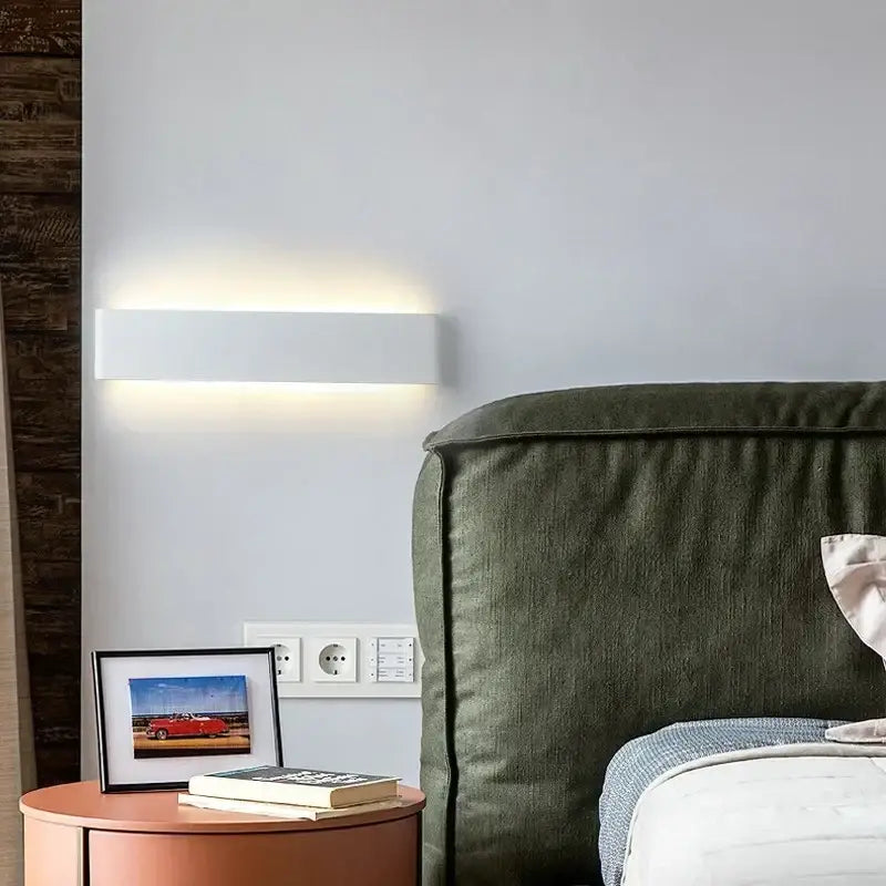 White rectangular led wall lamp with sleek modern design providing warm glow for bedroom wall lamp use