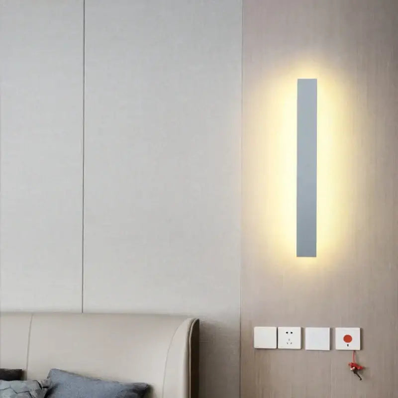 Modern black rectangular led wall light with sleek minimalist design and warm ambient lighting for living room decorbites wall light