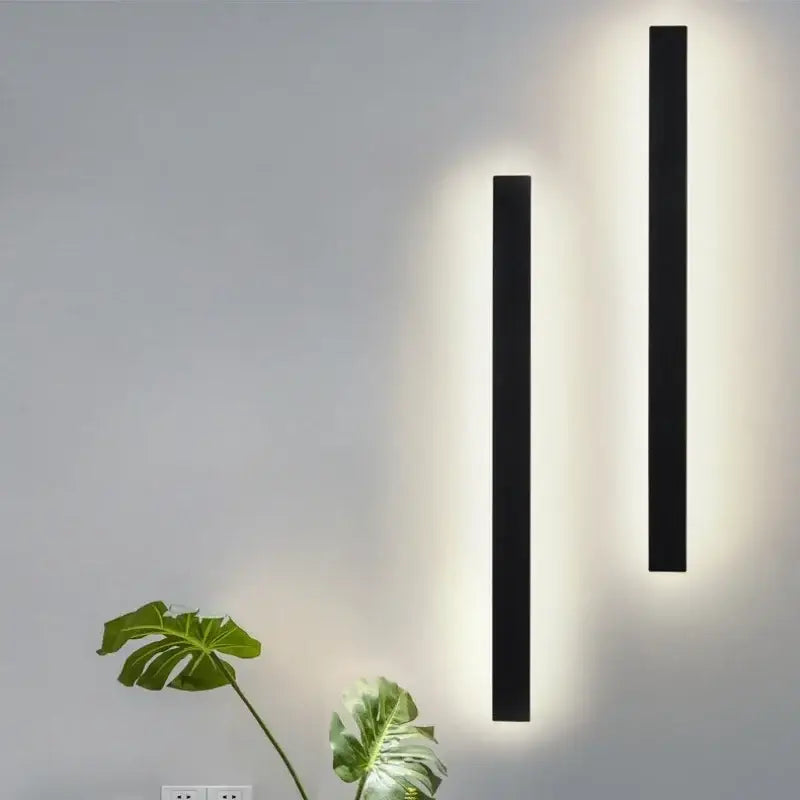 Modern black rectangular led wall light featuring two sleek sconces with warm diffused glow for living room decorbites wall light