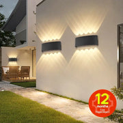 Modern black rectangular led wall light with warm diffused lighting perfect for garden or living room decorbites wall light
