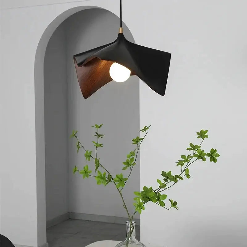 Modern black resin led pendant chandelier with wood-textured asymmetrical design for living room decorbites black resin