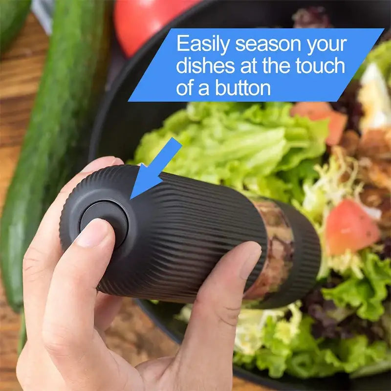 Black textured automatic salt pepper grinder with ribbed design and button top for easy kitchen seasoning use