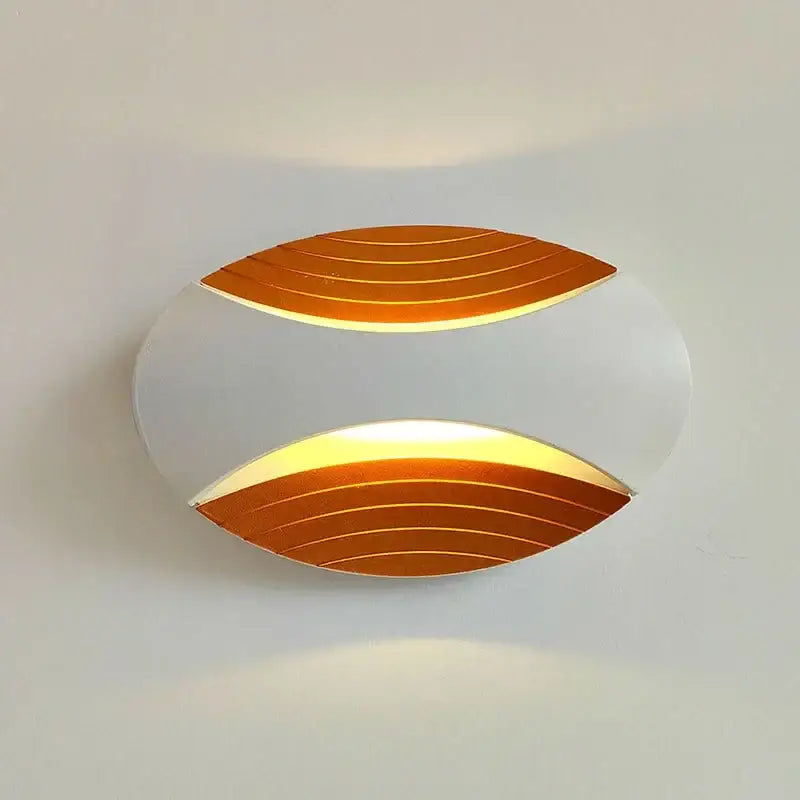 Modern led wall lamp with sleek white and warm gold finish featuring two oval illuminated panels for corridor use