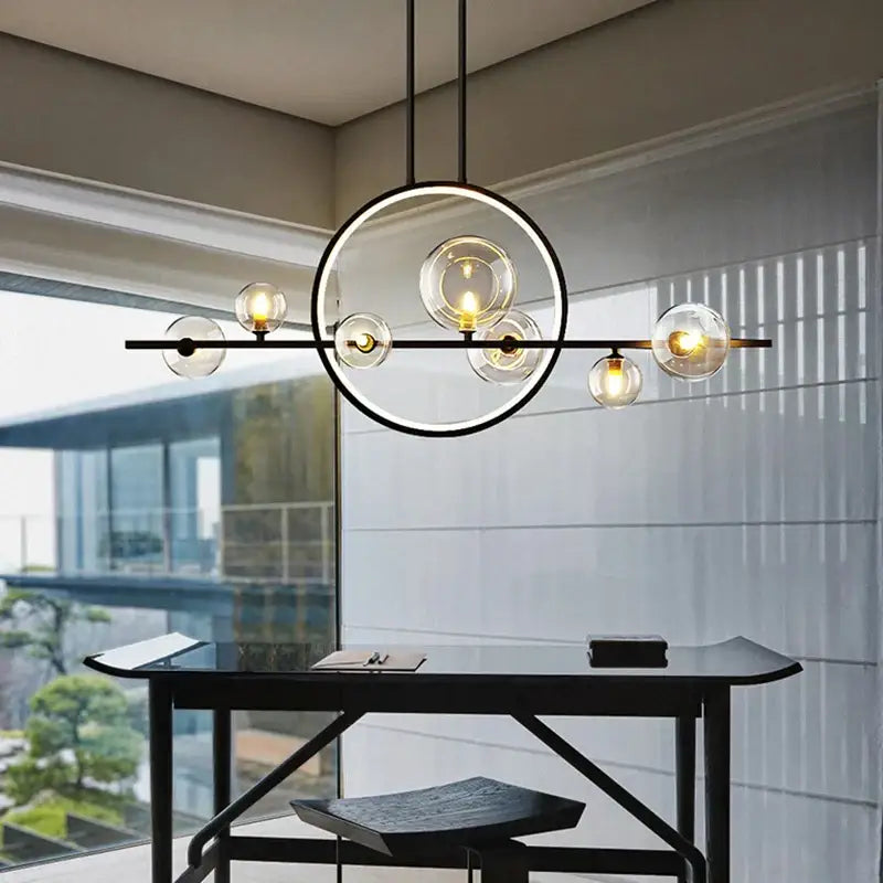 Modern black ring pendant light with clear glass globe bulbs and metal frame ideal for dining room decorbites black ring