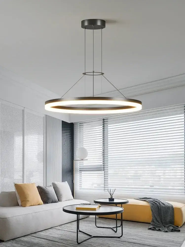 Modern black ring pendant chandelier with sleek metallic frame and warm diffused led lighting for living room decorbites black ring