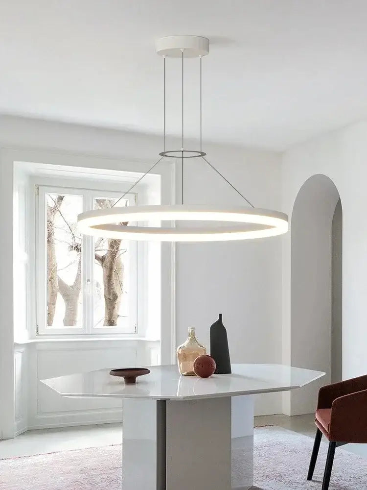 Modern black ring pendant chandelier with sleek white circular light and thin metallic suspension cords by decorbites black ring