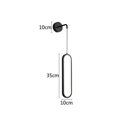Modern black ring led wall lamp with sleek elongated oval design and slim frame for bedroom decorbites black ring lighting