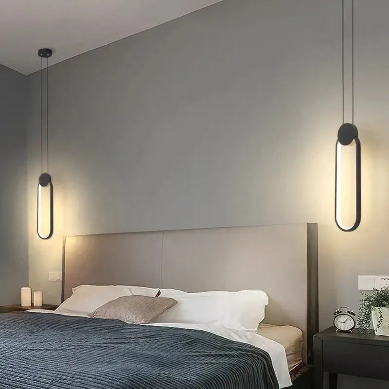 Modern black ring pendant lamp with sleek elongated oval design and warm ambient dimmable led lighting for bedroom decorbites black ring pendant