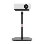 White lg projector on a modern black and rose gold decorbites adjustable height monitor stand office accessory
