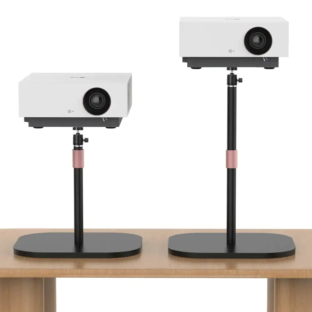 Two white lg projectors on modern black and rose gold decorbites adjustable height monitor stands for office use