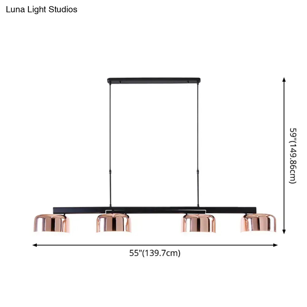 Modern black rose gold diner island lamp with copper-finished pendant lights and sleek black metal frame for dining room