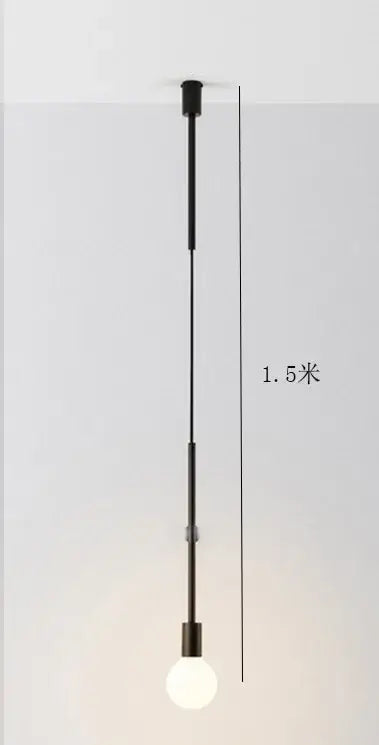 Modern black rose gold minimalist pendant light with exposed bulb ideal for dining room decorbites black rose design