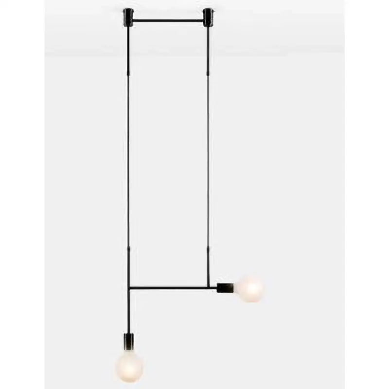 Modern black rose gold minimalist pendant light with two exposed bulbs suspended by slender rods for dining room decorbites black rose