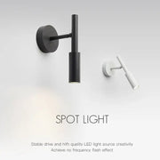 Modern black cylindrical rotatable led wall lamp with sleek design ideal for bedroom spotlight lighting