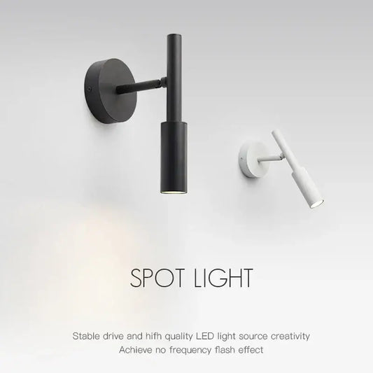Modern black cylindrical rotatable led wall lamp with sleek design ideal for bedroom spotlight lighting