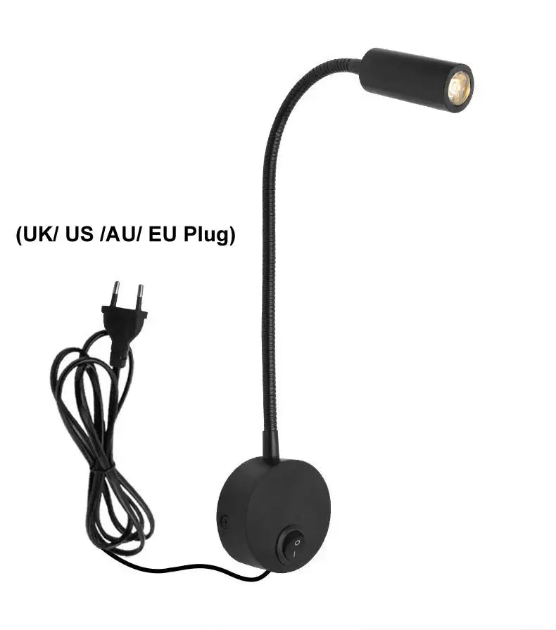 Modern black led wall lamp featuring a flexible gooseneck, circular base, and adjustable head for bedroom spotlight use