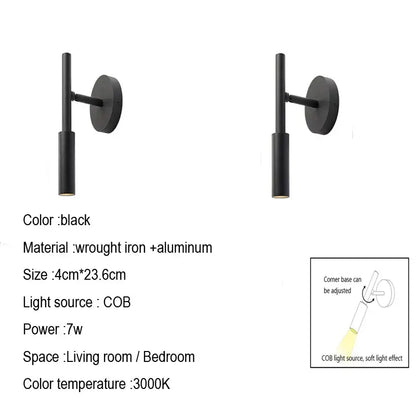 Modern black rotatable led wall lamp made of wrought iron and aluminum with a sleek cylindrical design for bedroom use