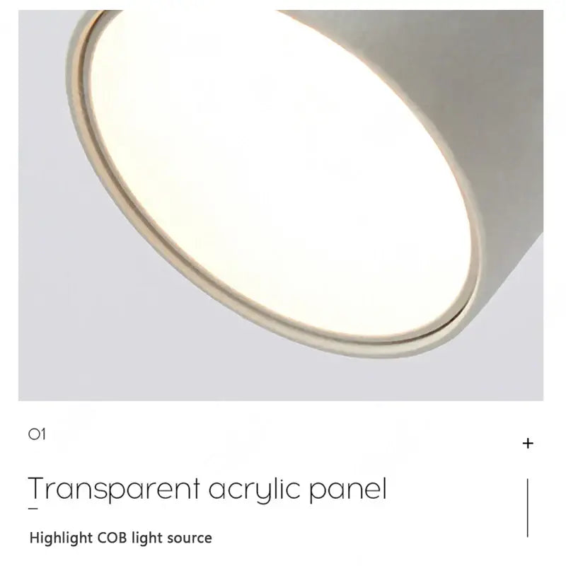Modern black rotatable led wall lamp with transparent acrylic panel and smooth curved edge glowing with white light