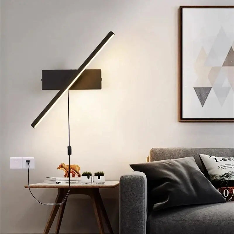 Modern black rotatable led wall sconce with sleek angular design and adjustable light beam for bedroom decorbites led wall use