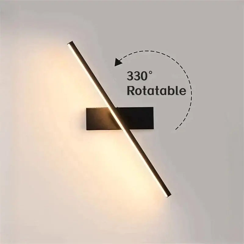 Modern black rotatable led wall sconce with sleek elongated light bar emitting warm illumination for bedroom decorbites led wall decor