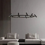 Modern black round ring chandelier with sleek cylindrical light fixtures for stylish round ring ceiling decorbites black round design
