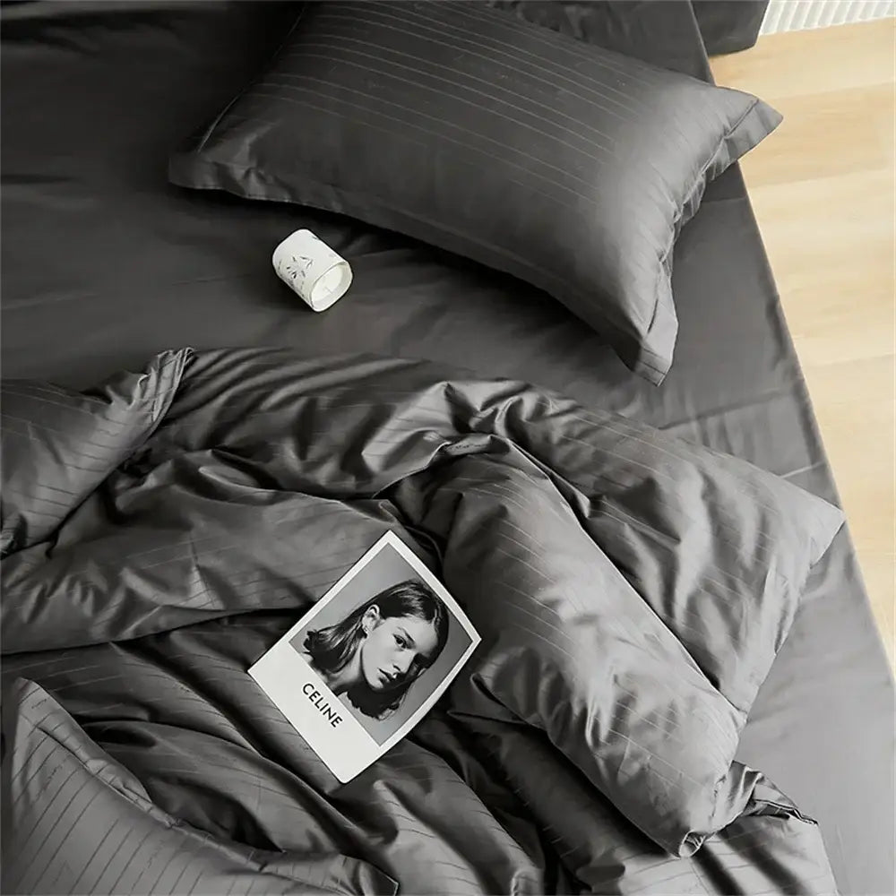 Modern black satin jacquard duvet cover set with dark gray striped satin bedding and fine vertical pinstripes for bedroom use