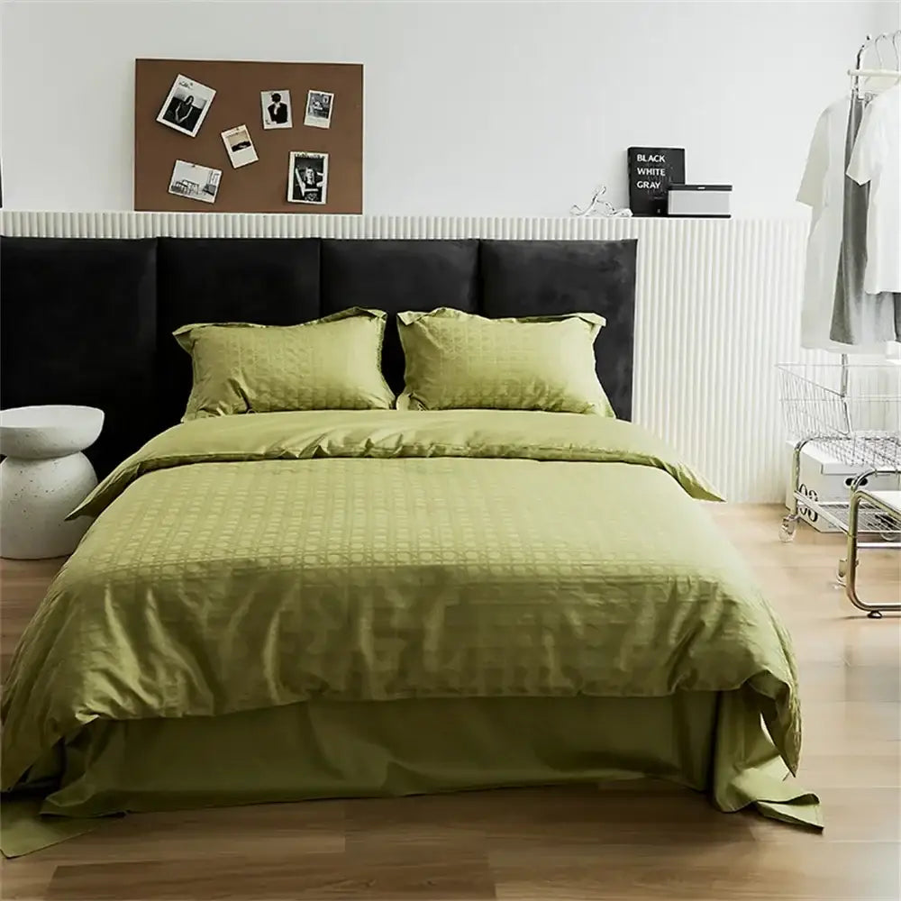 Olive green textured duvet cover set with satin jacquard finish and matching pillows for modern bedroom use