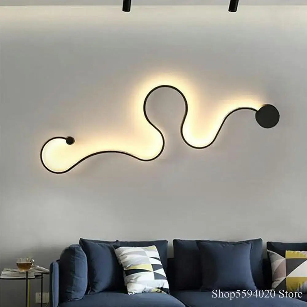 Modern black serpentine led wall lamp with a flowing design and warm ambient lighting for living room use