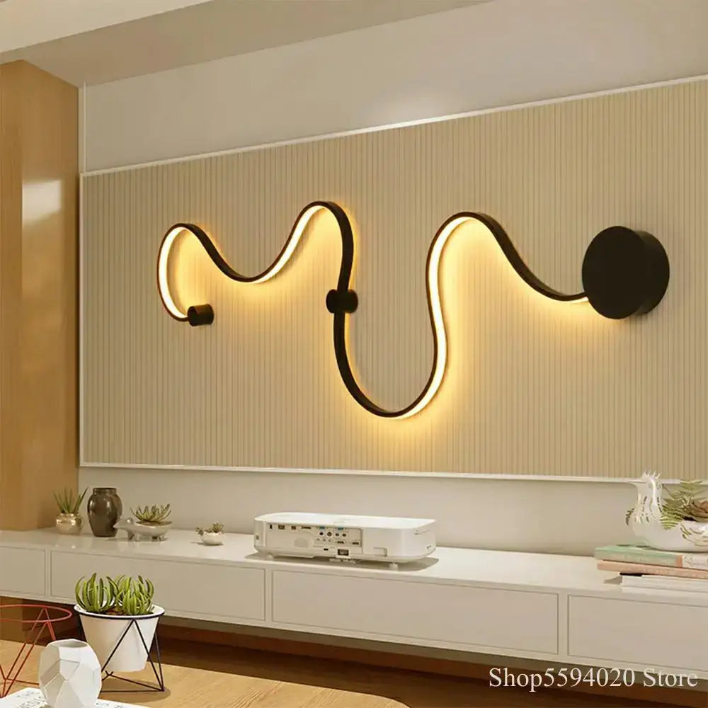 Modern black and gold led wall lamp with sleek curved serpentine design for living room illumination