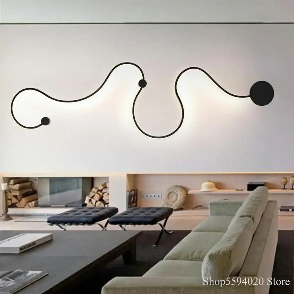 Modern black serpentine led wall lamp with sleek curved lines and spherical accents for living room use