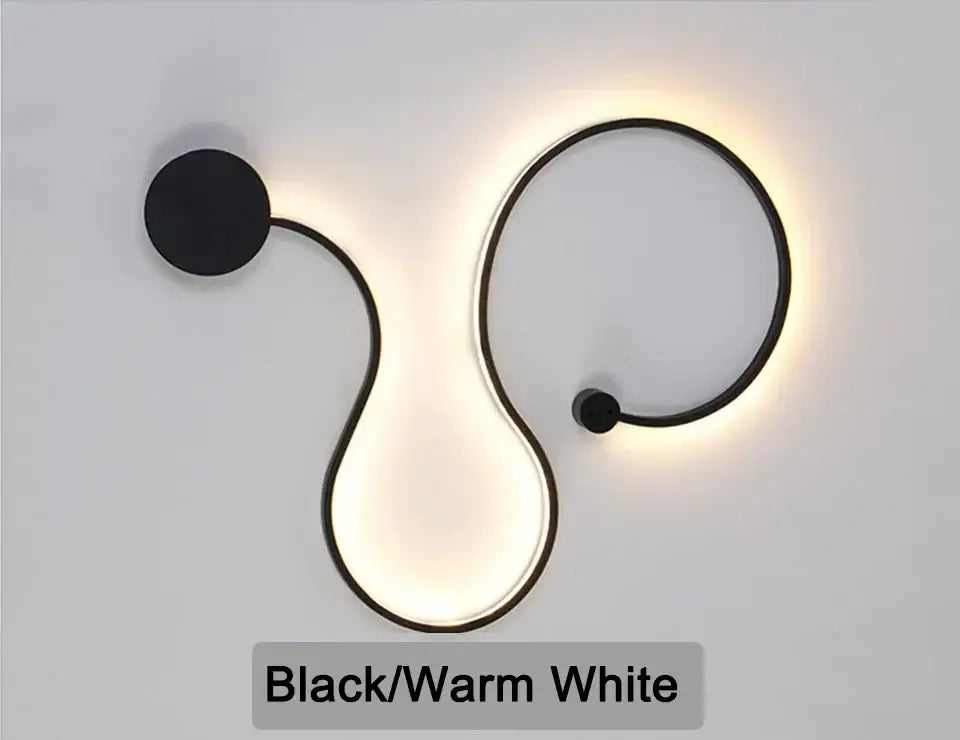 Modern black serpentine led wall lamp with sleek curved design and warm white light for living room use
