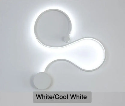 Modern white led ceiling light with sleek curved design and cool white illumination complementing led wall lamp setup