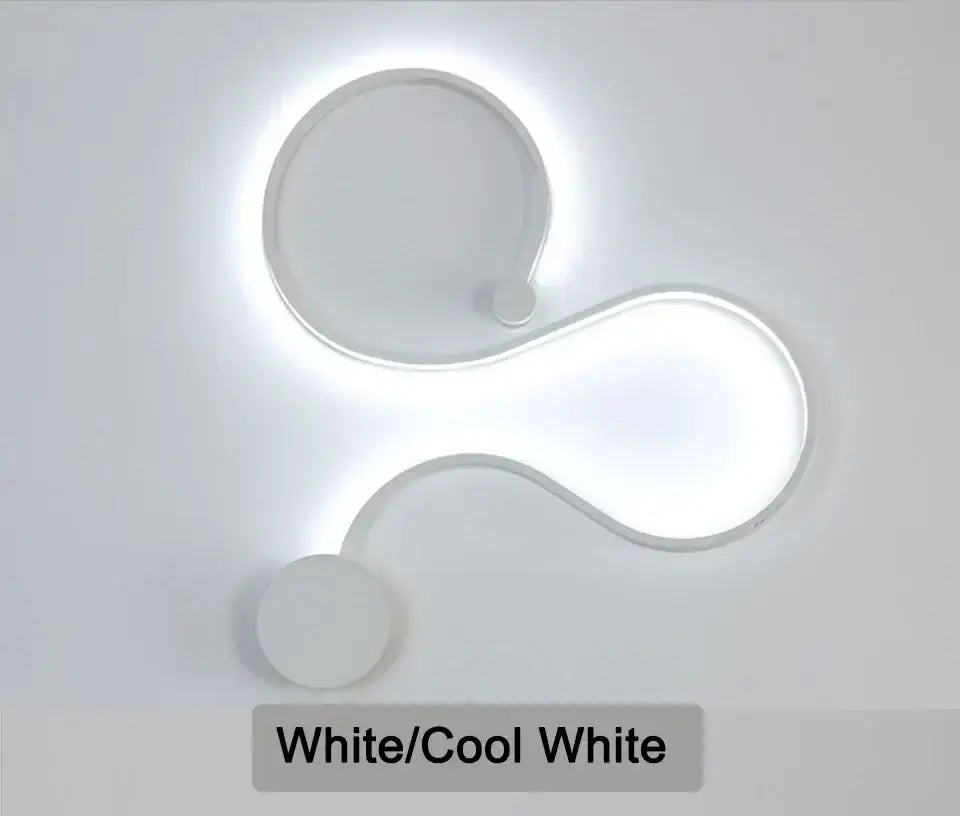 Modern white led ceiling light with sleek curved design and cool white illumination complementing led wall lamp setup