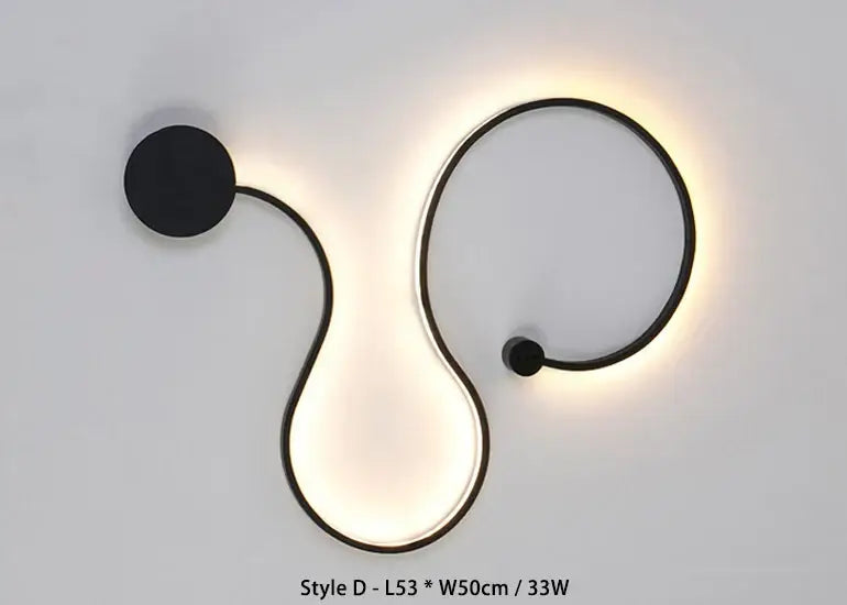 Modern black serpentine led wall sconce with sleek curved design and warm ambient lighting for living room decorbites led wall