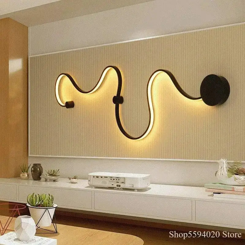 Modern black serpentine led wall sconce with sleek frame and warm yellow backlighting for stylish living room decorbites led wall