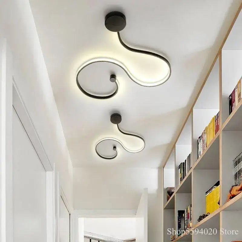 Modern black serpentine led wall sconce with sleek curved design for living room decorbites led wall sconce