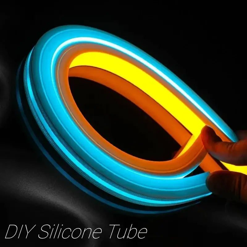 Modern black silicone tube flexible led channel outdoor light with a glowing blue outer layer and orange inner core silicone tube