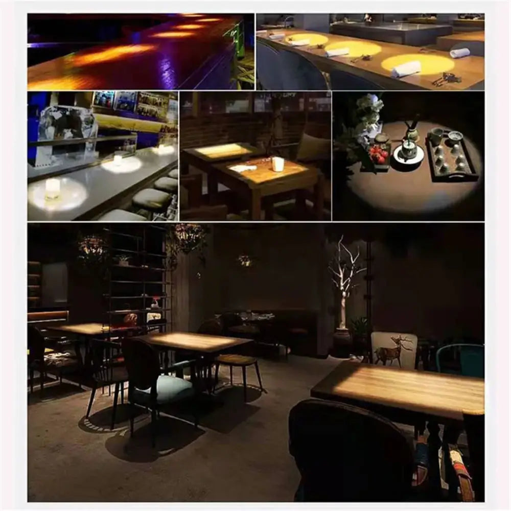 Modern black and silver decorbites adjustable led track spotlights illuminating dark wood tables in dim restaurant interior