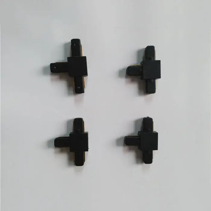 Black plastic cross-shaped connector set for decorbites ceiling track rail in modern black and silver kitchen light design