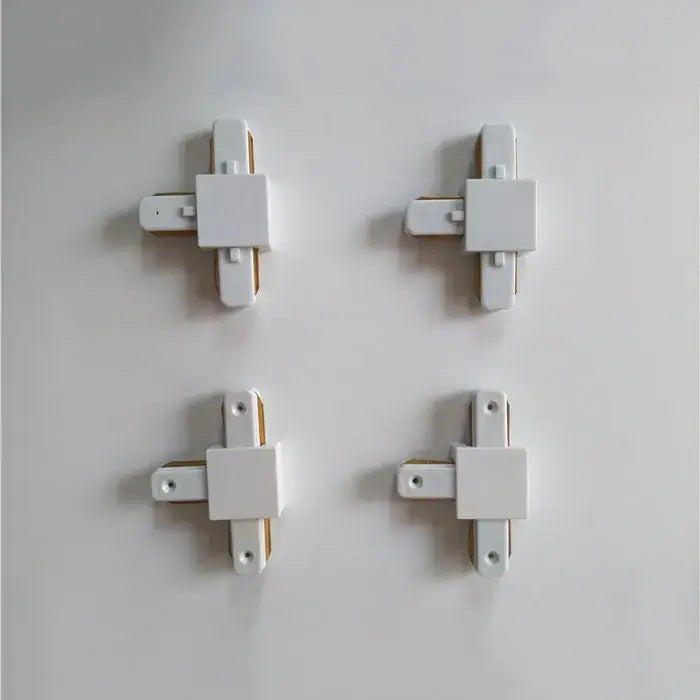 White plastic decorbites ceiling track connectors with gold metal inserts for modern black and silver ceiling track rail set