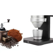 Modern black and silver coffee tamper bowl with a calibrated dosing ring top for precise brewing in the kitchen
