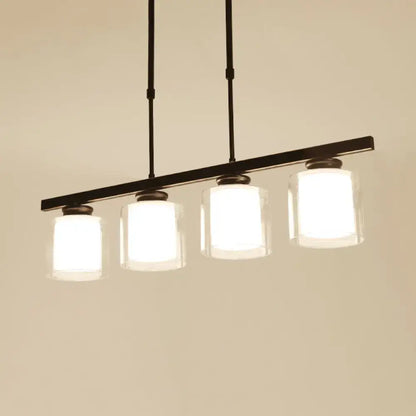 Modern black metal pendant light with four clear glass cylindrical shades ideal for cooking space with e26 e27 bulbs