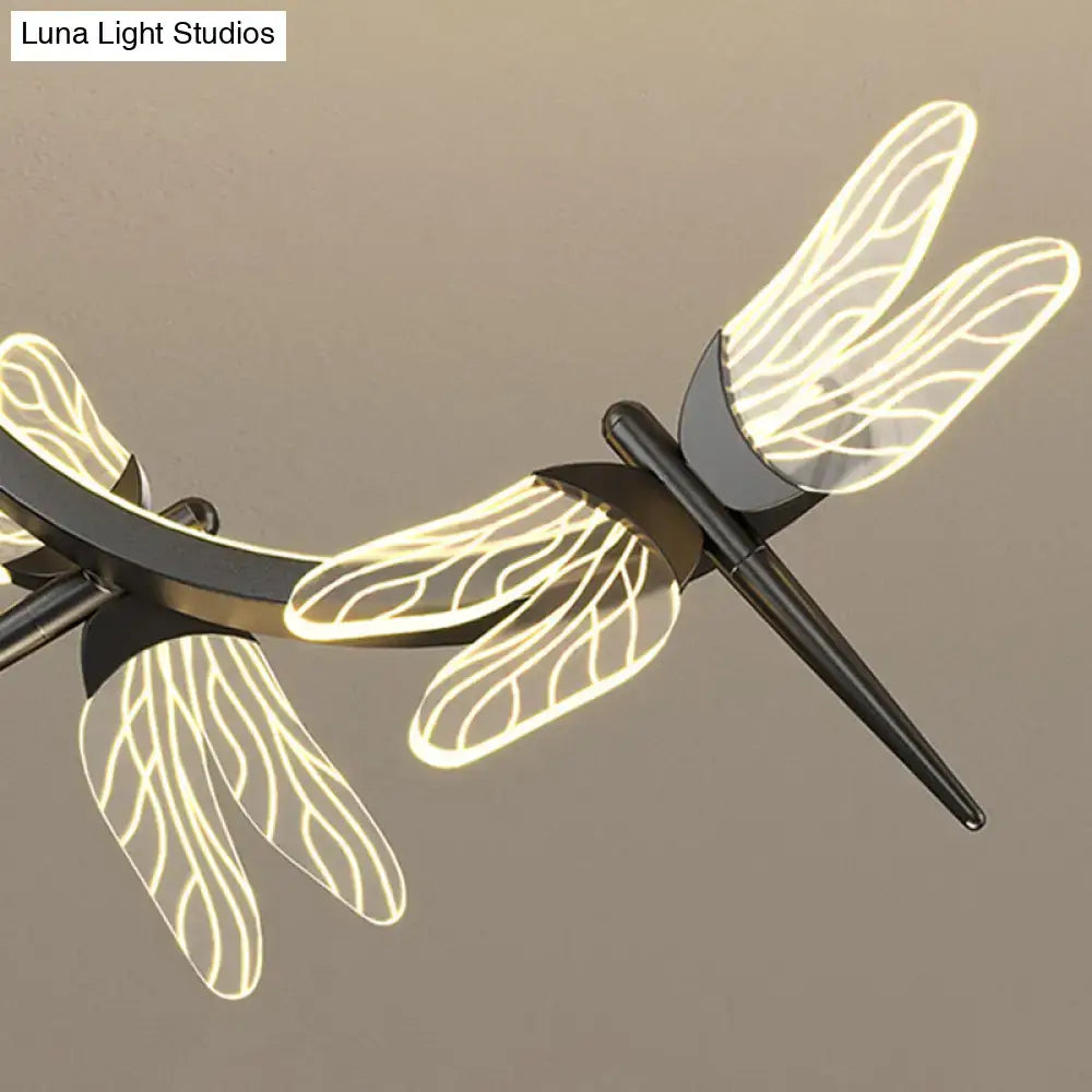 Modern black dragonfly-shaped ceiling light with translucent veined wings and stepless dimming for restaurant ceilings