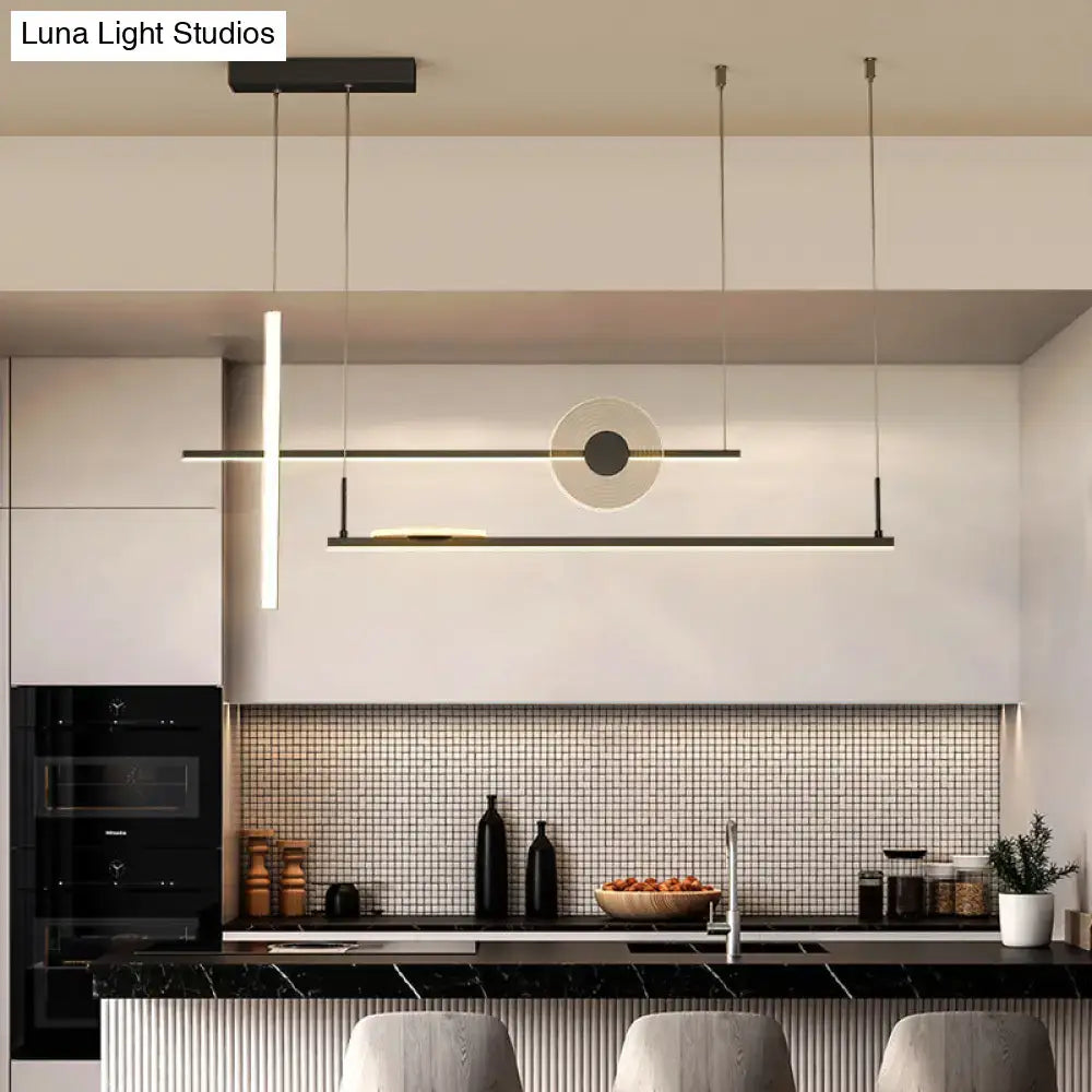 DecorBites contemporary black and white acrylic light fixture with geometric design as a dining room island chandelier