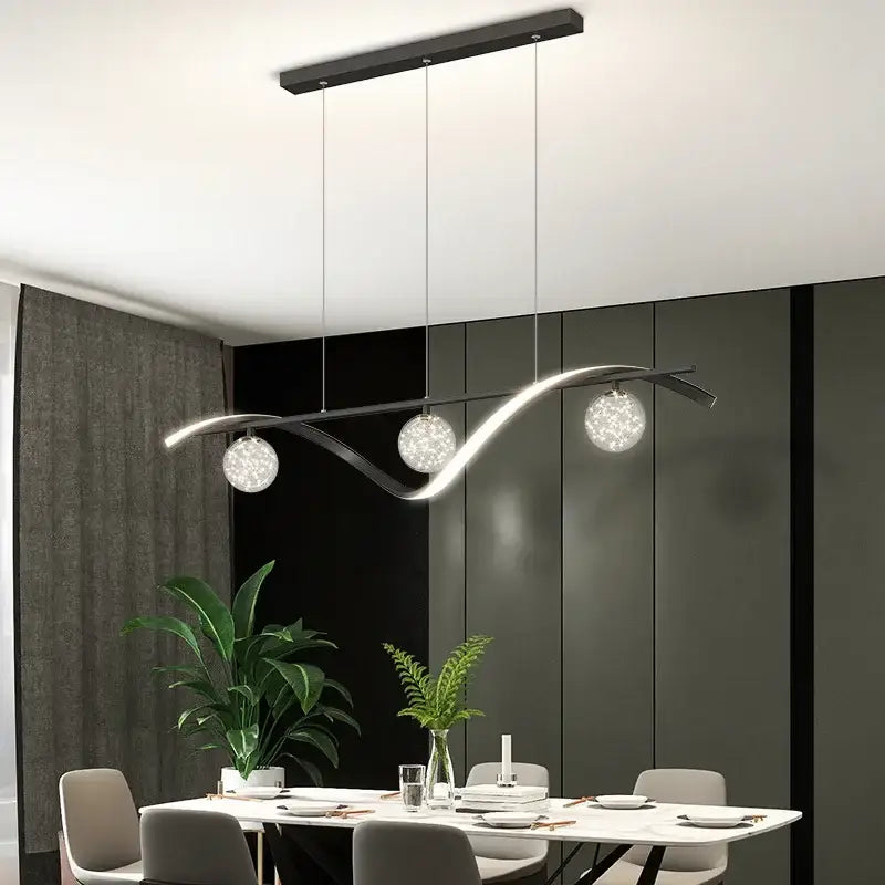 Modern black metal pendant light with three silver decorbites glass ball led globes for dining room decor