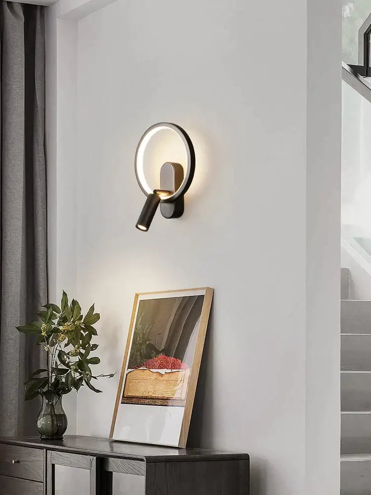 Modern black and silver wall lamp with adjustable spotlight featuring sleek brass copper led accents for decorbites style